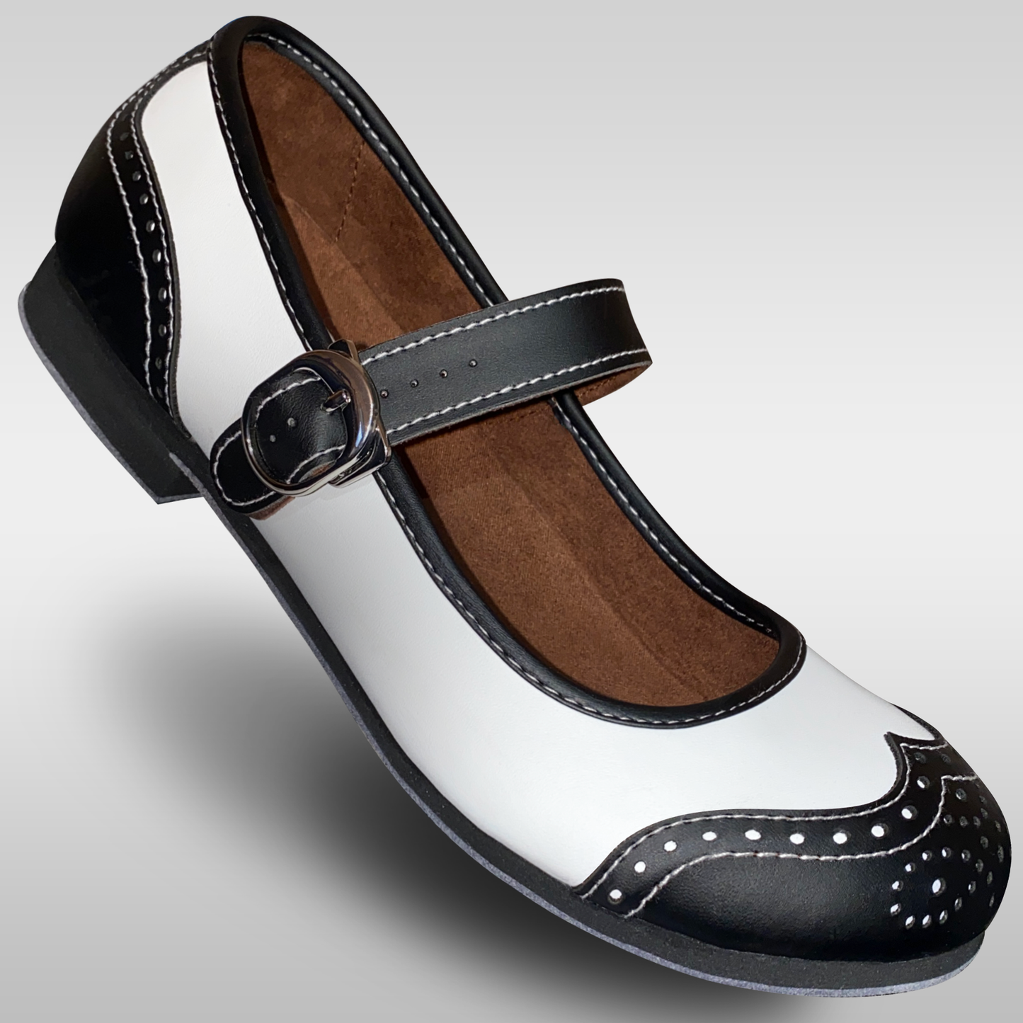 Womens black and white mary jane shoes that are feather light and have an adjustable buckle to be used for lindy hop west coast swing ballroom and more dance styles