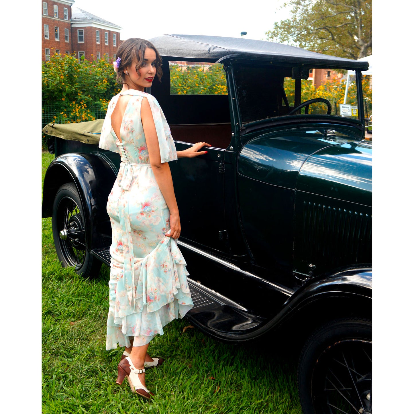 Beautiful woman next to classic car in Aris Allen Dance Heels